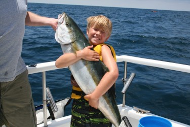kid with fish