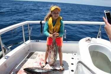 kid with fish